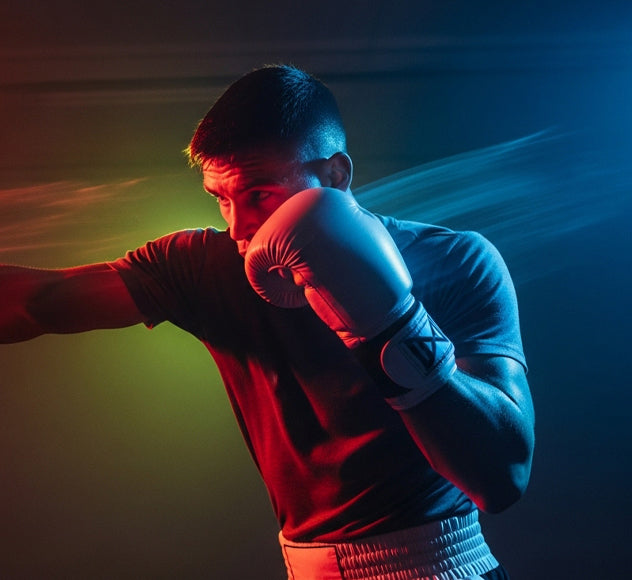 Oscar De La Hoya throwing a left jab during a professional boxing match